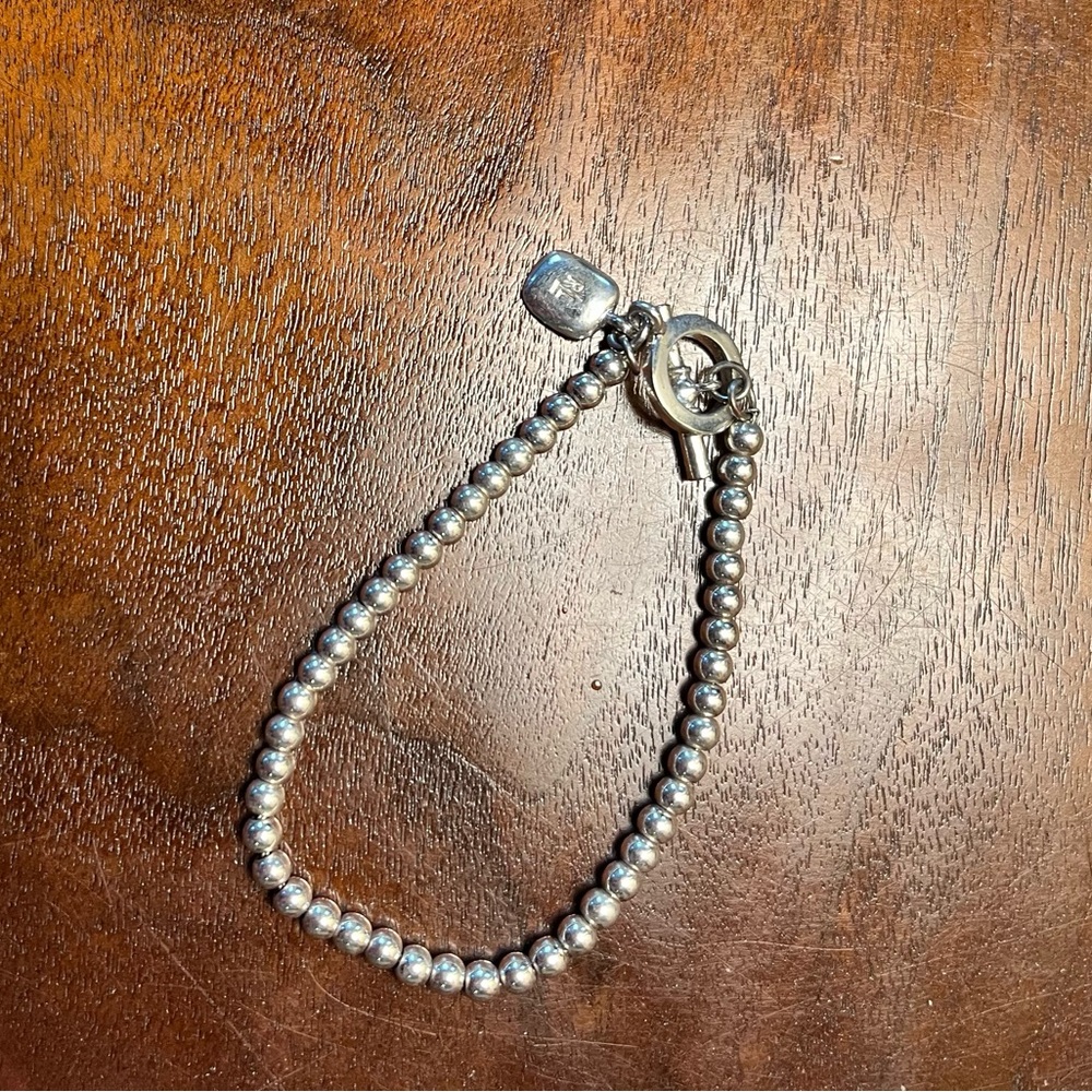 Lauren Ralph Lauren silver bead bracelet.